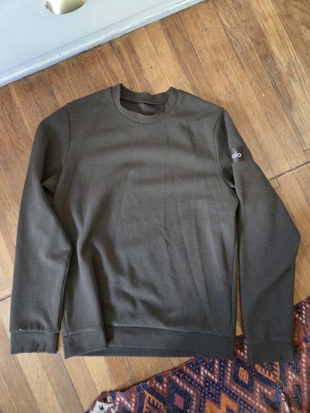 ALO Yoga Men’s Crewneck Waffle Knit Sweater in Olive Green